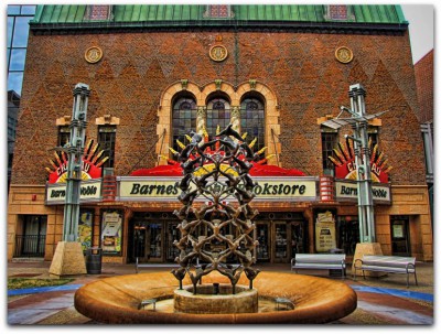 An image taken through a fountain outside the theater's main entrance on Peace Plaza