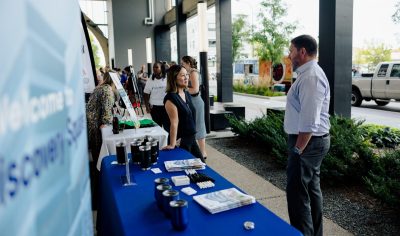 Vendor speaking with attendee